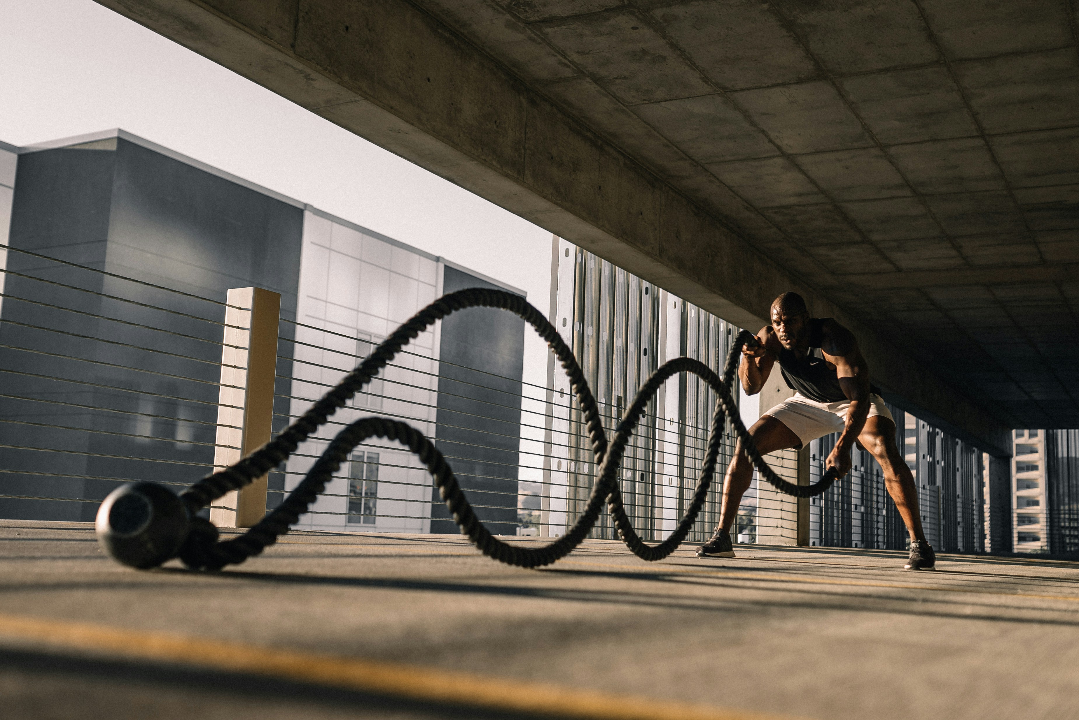 Man working out with battle ropes
